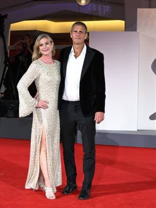 Venice, Italy: Venice, 82nd Venice International Film Festival 2025 - Evening 4 - Red Carpet for the film The Last Viking . Pictured: Anders Thomas Jensen with his wife Venice Italy  - ZUMAp169 20250830_zea_p169_1871 Copyright: xSimonexComix