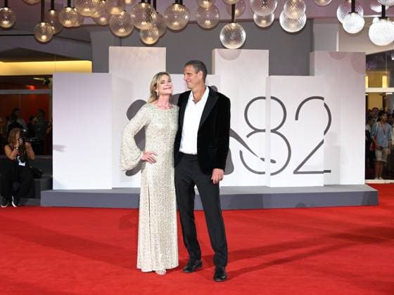 Venice, Italy: Venice, 82nd Venice International Film Festival 2025 - Evening 4 - Red Carpet for the film The Last Viking . Pictured: Anders Thomas Jensen with his wife Venice Italy  - ZUMAp169 20250830_zea_p169_1880 Copyright: xSimonexComix