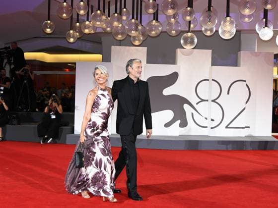 Venice, Italy: Venice, 82nd Venice International Film Festival 2025 - Evening 4 - Red Carpet for the film The Last Viking . Pictured: Mads Mikkelsen with his wife Hanne Jacobsen. Venice Italy  - ZUMAp169 20250830_zea_p169_1860 Copyright: xSimonexComix