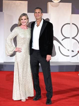Venice, Italy: Venice, 82nd Venice International Film Festival 2025 - Evening 4 - Red Carpet for the film The Last Viking . Pictured: Anders Thomas Jensen with his wife Venice Italy  - ZUMAp169 20250830_zea_p169_1873 Copyright: xSimonexComix