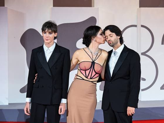 Venice, ITALY: Venice, 82nd Venice International Film Festival 2025 - Evening 4 - Red Carpet of the film The Valley of Smiles - Pictured: Giulio Feltri, Romana Maggiora Vergano, Paolo Strippoli Venice ITALY  - ZUMAp169 20250830_zea_p169_1971 Copyright: xManuelexMangiarottix