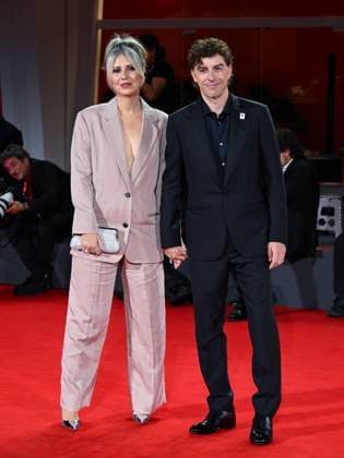Venice, ITALY: Venice, 82nd Venice International Film Festival 2025 - Evening 4 - Red Carpet of the film The Valley of Smiles - Pictured: Michele Riondino, Eva Nestori Venice ITALY  - ZUMAp169 20250830_zea_p169_2004 Copyright: xManuelexMangiarottix