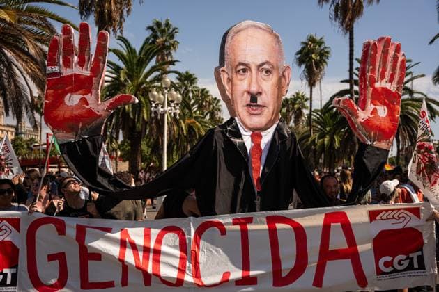 The Global Sumud Flotilla Departs From Barcelona To Gaza With More Than 20 Ships And More Than 300 People A poster depicting Israeli Prime Minister Benjamin Netanyahu with the word Genocida is seen during the Global Sumud Flotilla event as it leaves the Port of Barcelona for Gaza, aiming to establish a humanitarian corridor by sea, pressure governments worldwide, and denounce the blockade, in Barcelona, Spain, on August 31, 2025. Barcelona Barcelona Spain  Copyright: xMarcxAsensiox originalFilename: asensioclupes-globalsu250831_npU5i.jpg