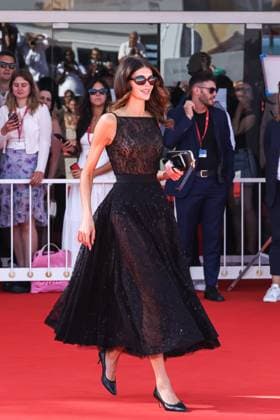 Venice, 82nd Venice International Film Festival - Day 6 - Model Kaia Gerber on the set of The Testament of Ann Lee, a film by her new boyfriend Lewis Pullman. Pictured: Kaia Gerber  Copyright: xAlessandroxBremecx xipa-agency.netx xx IPA_Agency_IPA63871540