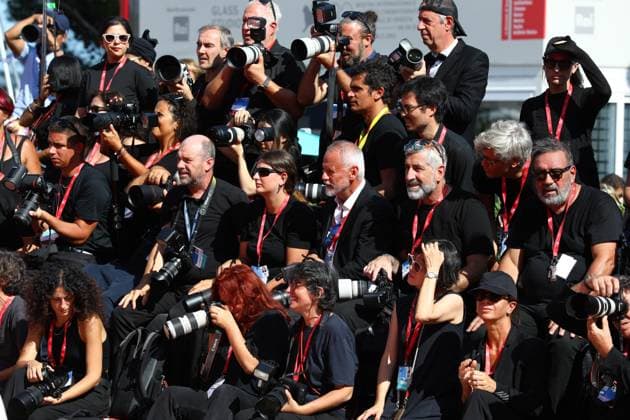September 1, 2025, Venice, Veneto, Italy: Official photographers under the harsh sun for the red carpet for The Testament of Ann Lee Premiere screening at the 82nd Venice Film Festival at the Venice Lido, Italy. Venice Italy - ZUMAc179 20250901_zep_c179_167 Copyright: xMickaelxChavetx