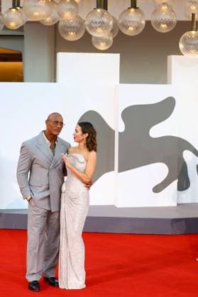September 1, 2025, Venice, Veneto, Italy: EMILY BLUNT and DWAYNE JOHNSON pose on the red carpet for The Smashing Machine Premiere screening at the 82nd Venice Film Festival at the Venice Lido, Italy. Venice Italy - ZUMAc179 20250901_zep_c179_202 Copyright: xMickaelxChavetx