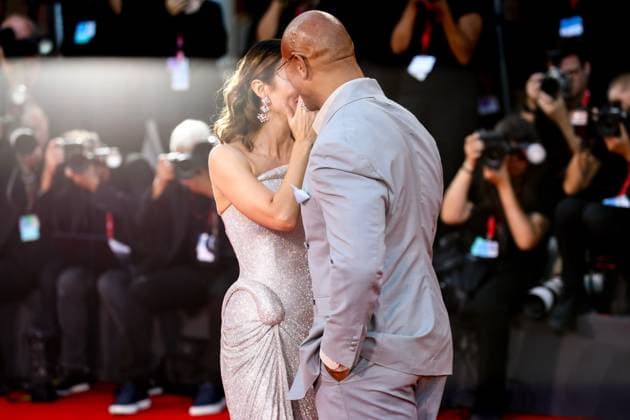 September 1, 2025, Venice, Veneto, Italy: EMILY BLUNT and DWAYNE JOHNSON have fun on the red carpet for The Smashing Machine Premiere screening at the 82nd Venice Film Festival at the Venice Lido, Italy. Venice Italy - ZUMAc179 20250901_zep_c179_206 Copyright: xMickaelxChavetx