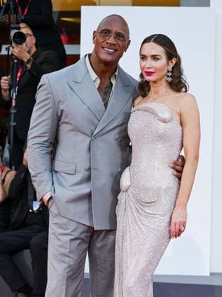Venice, ITALY: Venice, 82nd Venice International Film Festival 2025 - evening 6, red carpet of the film The Smashing Machine In the photo: Emily Blunt Dwayne Johnson The Rock Venice ITALY  - ZUMAp169 20250901_zea_p169_1304 Copyright: xSimonexComix