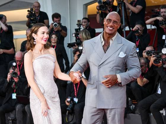 Venice, ITALY: Venice, 82nd Venice International Film Festival 2025 - evening 6, red carpet of the film The Smashing Machine In the photo: Emily Blunt Dwayne Johnson The Rock Venice ITALY  - ZUMAp169 20250901_zea_p169_1321 Copyright: xSimonexComix