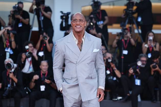 (250901) -- VENICE (ITALY), Sept. 1, 2025 -- Dwayne Johnson poses at the red carpet before the premiere of the film Smashing Machine during the 82nd Venice Film Festival in Venice, Italy, Sept. 1, 2025. ) ITALY-VENICE-FILM FESTIVAL-SMASHING MACHINE-PREMIERE LixJing 