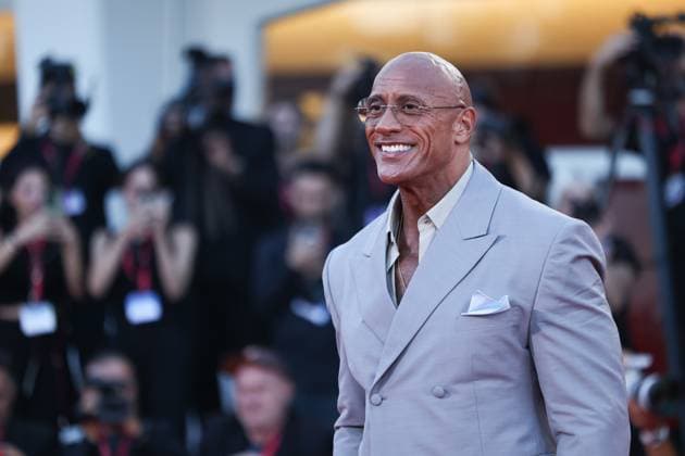 (250901) -- VENICE (ITALY), Sept. 1, 2025 -- Dwayne Johnson poses at the red carpet before the premiere of the film Smashing Machine during the 82nd Venice Film Festival in Venice, Italy, Sept. 1, 2025. ) ITALY-VENICE-FILM FESTIVAL-SMASHING MACHINE-PREMIERE LixJing 