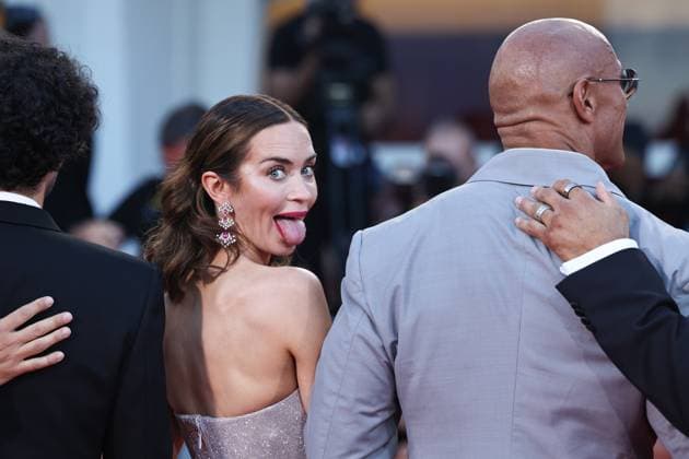 (250901) -- VENICE(ITALY), Sept. 1, 2025 -- Emily Blunt gestures at the red carpet before the premiere of the film Smashing Machine during the 82nd Venice Film Festival in Venice, Italy, Sept. 1, 2025. ) ITALY-VENICE-FILM FESTIVAL-SMASHING MACHINE-PREMIERE LixJing 
