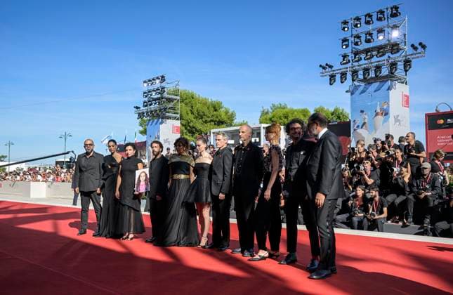 January 1, 2021, Venice, Italy: The cast holds a picture of Hind Rajab on the red carpet for the premiere of ˜The voice of Hind Rajab™ during the 82nd Venice Film Festival in Venice, Italy, 03 September 2025. The movie is presented in official competition Venezia 82 at the festival running from 28 August to 6 September 2025. ANSA RICCARDO ANTIMIANI. Venice Italy  - ZUMAa110 20210101_zaf_a110_306 Copyright: xRiccardoxAntimianix