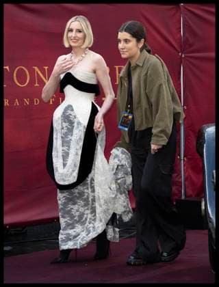 . 03 09 2025. London, United Kingdom. A tricky arrival for Laura Carmichael on a soaking wet red carpet after a downpour of rain just before the start of the Downton Abbey : The Grand Finale world premiere in London.  xStephenxLockx xi-Imagesx IIM-26185-0030