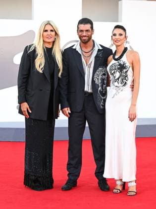 Venice, Italy: Venice, 82nd Venice International Film Festival 2025 - Evening 9. Red Carpet for the film Elisa. Pictured are Tiziana Rocca, Sara Bluma, and Can Yaman. Venice Italy  - ZUMAp169 20250904_zea_p169_1200 Copyright: xManuelexMangiarottix