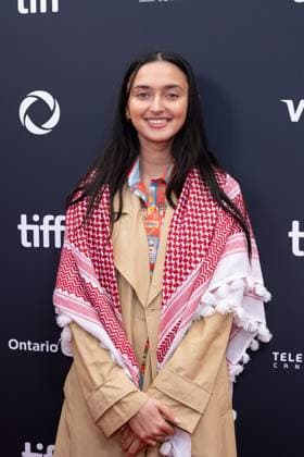 September 5, 2025, Toronto, Ontario, Canada: A guest wearing Palestine keffiyeh attends the red carpet for the Palestine 36 premiere during the 2025 Toronto International Film Festival at Roy Thomson Hall. on September 5, 2025 in Toronto, Canada. Toronto Canada - ZUMAe321 20250905_zea_e321_073 Copyright: xLeonardoxRamirezx