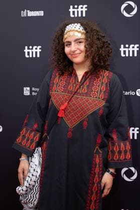 September 5, 2025, Toronto, Ontario, Canada: A guest wearing Palestine dress attends the red carpet for the Palestine 36 premiere during the 2025 Toronto International Film Festival at Roy Thomson Hall. on September 5, 2025 in Toronto, Canada. Toronto Canada - ZUMAe321 20250905_zea_e321_005 Copyright: xLeonardoxRamirezx