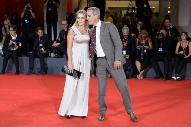 Silent friend red carpet in Venice Lido, Italy - 05 Sep 2025 Claudia Gerini (l) and Riccardo Sangiuliano (r) attend the Silent friend red carpet during the 82nd Venice Film Festival at Palazzo del Cinema. Venice Lido Italy Copyright: xMarioxCartellix xSOPAxImagesx _DSC7585