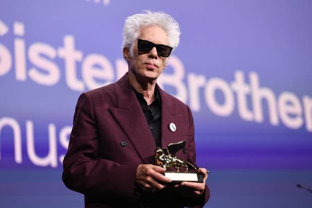 (250907) -- VENICE, Sept. 7, 2025 -- American director Jim Jarmusch poses with the trophy at the 82nd Venice International Film Festival in Venice, Italy, Sept. 6, 2025. American director Jim Jarmusch s Father Mother Sister Brother won the Golden Lion for Best Film. The 82nd edition of the Venice International Film Festival ran from Aug. 27 to Sept. 6 at the Lido island of the Italian lagoon city, with 21 films in the main competition lineup. ) ITALY-VENICE-FILM FESTIVAL-AWARDING CEREMONY LixJing 