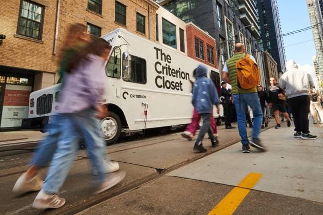 September 7, 2025, Toronto, On, Canada: Festival-goers pass the Criterion Closet mobile video library during its stop at the Toronto International Film Festival in Toronto, on Sunday, Sept. 7, 2025. Toronto Canada  - ZUMAc35_ 20250907_zaf_c35_006 Copyright: xSammyxKoganx
