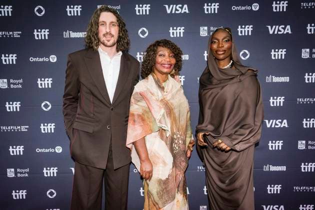 September 7, 2025, Toronto, On, CAN: Michaela Coel, right, is photographed with her mother Marion Osbourne, centre, and partner Spencer Hewett as they arrive on the red carpet to promote the film The Christophers at the Toronto International Film Festival in Toronto on Sunday September 7, 2025. Toronto CAN  - ZUMAc35_ 20250907_zaf_c35_130 Copyright: xChrisxYoungx