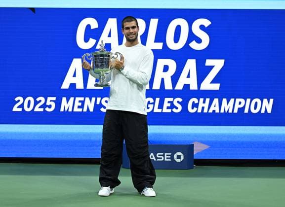 FLUSHING NY- SEPTEMBER 07: Carlos Alcaraz poses with the championship trophy after defeating Jannik Sinner during the finals at the US Open On Arthur Ashe Stadium at the USTA Billie Jean King National Tennis Center on September 7, 2025 in Flushing Queens. Copyright: xmpi04x