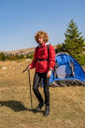 A male hiker solo camping and hiking in the mountain forest adventure travel. A male hiker solo camping and hiking in the mountain forest adventure travel. High quality photo, model released, , 95976000.jpg RECORD DATE NOT STATED