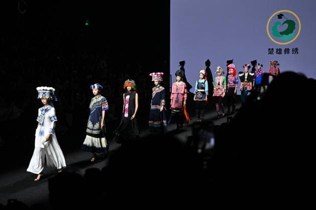 (250908) -- BEIJING, Sept. 8, 2025 -- Models present creations featuring embroidery of Yi ethnic group from Chuxiong Yi Autonomous Prefecture of southwest China s Yunnan Province during the 2025 China Fashion Week (Autumn) in Beijing, capital of China, Sept. 8, 2025. ) CHINA-BEIJING-FASHION WEEK-EMBROIDERY OF YI ETHNIC GROUP-CREATIONS (CN) JinxLiangkuai 