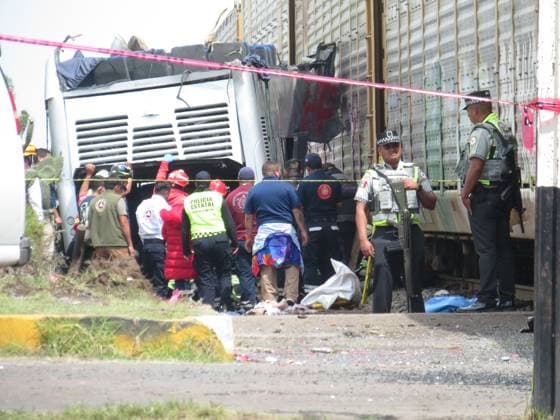 (250908) -- ATLACOMULCO(MEXICO), Sept. 8, 2025 -- Rescue workers work at the accident site in the Atlacomulco municipality, the State of Mexico, Mexico, Sept. 8, 2025. At least eight people were killed and 45 others injured early Monday when a double-deck passenger bus was hit by a train in central Mexico, authorities said. (Photo by Jorge Alvarado Xinhua) MEXICO-ATLACOMULCO-CRASH-ACCIDENT LixMengxintonglian 