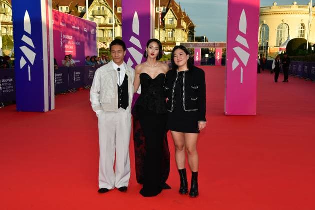 51st Deauville American film festival, jour 3 US film director Jing Ai Ng (R), US actors Brandon Soo Hoo (L) and Andie Ju pose as they arrive for the screening of their movie The Forge during the 51st edition of the Deauville American film festival, in Deauville, northwestern France, on September 8, 2025.  Copyright: xJeanxCharlesx