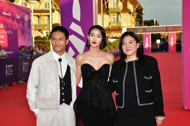 51st Deauville American film festival, jour 3 US film director Jing Ai Ng (R), US actors Brandon Soo Hoo (L) and Andie Ju pose as they arrive for the screening of their movie The Forge during the 51st edition of the Deauville American film festival, in Deauville, northwestern France, on September 8, 2025.  Copyright: xJeanxCharlesx