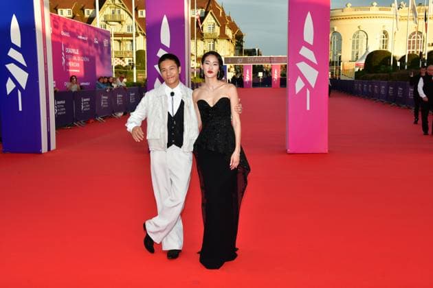 51st Deauville American film festival, jour 3 US film director Jing Ai Ng (R), US actors Brandon Soo Hoo (L) and Andie Ju pose as they arrive for the screening of their movie The Forge during the 51st edition of the Deauville American film festival, in Deauville, northwestern France, on September 8, 2025.  Copyright: xJeanxCharlesx