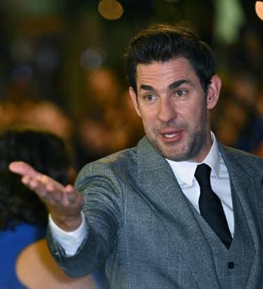 John Krasinski speaks to photographers as he arrives for the Toronto International Film Festival premiere of The Smashing Machine at the Princess of Wales Theatre in Toronto, Canada on Monday, September 8, 2025.  TOR2025090845 CHRISxCHEW