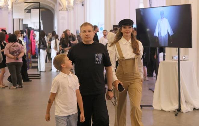 TV hosts Yurii Horbunov and Kateryna Osadcha and their son Ivan visit Day 2 of the Ukrainian Fashion Week SS26 at the Mystetskyi Arsenal National Culture, Art and Museum Complex, Kyiv, Ukraine, September 5, 2025. (Photo by Yuliia Ovsiannikova Ukrinform) Ukrainian Fashion Week SS26 in Kyiv  Copyright: xYuliiaxOvsiannikovax