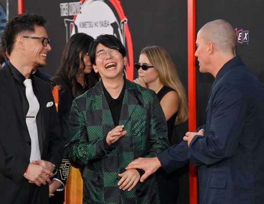 Cast members Natsuki Hanae (C) Channing Tatum (R) attends the premiere of the animated motion picture fantasy thriller Demon Slayer: Kimetsu no Yaibi Infinity Castle at the TCL Chinese Theatre in the Hollywood section of Los Angeles on Tuesday, September 9, 2025.  LAP2025090919 JIMxRUYMEN