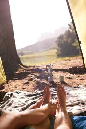 Legs, couple and rest in tent for camping, summer vacation and romantic getaway with adventure. People, love and relaxing for bonding together, outdoor holiday and weekend location of nature tourism Legs, couple and rest in tent for camping, summer vacation and romantic getaway with adventure. People, love and relaxing for bonding together, outdoor holiday and weekend location of nature tourism., model released, , 95800330.jpg RECORD DATE NOT STATED