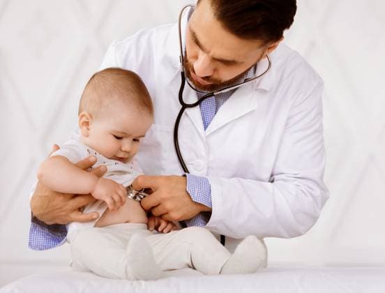 Doctor Examining Baby Boy Listening To His Heartbeat In Hospital Medical Checkup Concept. Doctor Pediatrician Examining Baby Boy Listening To His Heartbeat Checking Heart And Lungs In Hospital. Sick Little Patient Having Appointment In Clinic. Child Healthcare, model released, , 96617774.jpg RECORD DATE NOT STATED