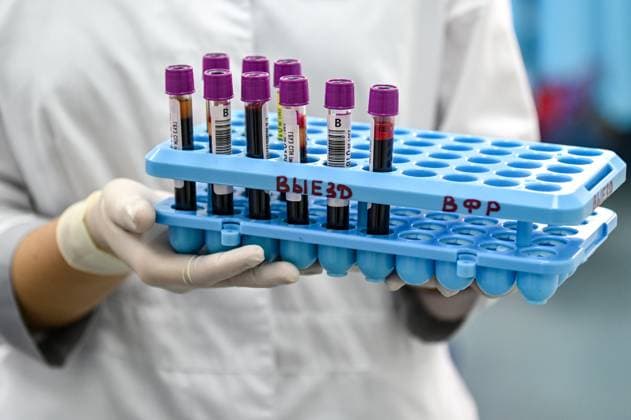 RUSSIA, KRASNODAR REGION - SEPTEMBER 11, 2025: A nurse with test tubes in a mobile blood donation centre in Ilsky during a Blood Donor Day campaign. The campaign is taking place in the Severskaya and Vyselki Districts and in Krasnodar. Igor Onuchin TASS  83878979