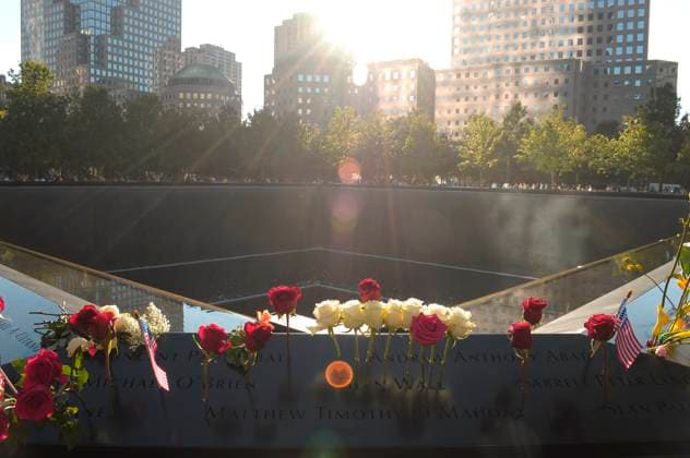 September 11 Anniversary and Memorial in New York City, US - 11 Sep 2025 Flowers are seen at the September 11 memorial pool. On the 24th anniversary of the September 11, 2001 terrorist attacks, people gathered in downtown Manhattan, New York City to pay tribute to those lost on 9 11. People visited the memorial pools at Ground Zero of the World Trade Center, planting flowers and photos of loved ones who perished on 9 11. New York United States Copyright: xJiminxKimx xSOPAxImagesx JKIM_sept_11_memorial_nyc_sep_11_25_DSC8612.jpeg