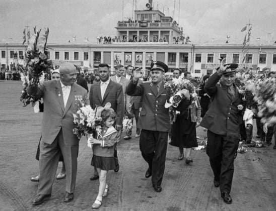 Moscow, USSR. Soviet cosmonauts Pavel Popovich and Andriyan Nikolayev, who performed the first joint multi-day spaceflight in the history of cosmonautics on Vostok 4 and Vostok 3 spacecraft, and First Secretary of the Central Committee of the Communist Party of the Soviet Union, Chairman of the Council of Ministers of the USSR Nikita Khrushchev (R-L front) take part in the welcoming ceremony at Vnukovo Airport. Vladimir Savostyanov TASS  32416521
