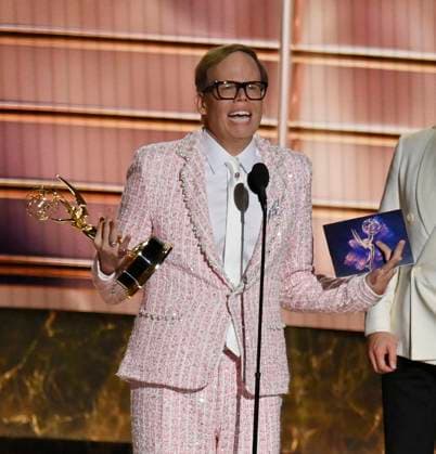 Jeff Hiller accepts the Outstanding Supporting Actor in a Comedy Series award for Somebody Somewhere onstage at the 77th annual Primetime Emmy Awards at the Peacock Theater in Los Angeles on Sunday, September 14, 2025.  LAP202509148020 JIMxRUYMEN