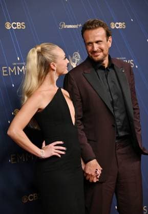 (L-R) Kayla Radomski and Jason Segel arrive for the 77th annual Primetime Emmy Awards at the Peacock Theater in Los Angeles on Sunday, September 14, 2025.  LAP2025091476 CHISxCHEW