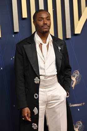 Dewayne Perkins arrives for the 77th annual Primetime Emmy Awards at the Peacock Theater in Los Angeles on Sunday, September 14, 2025.  LAP2025091479 CHISxCHEW