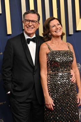 (L-R) Stephen Colbert and Evelyn McGee-Colbert arrive for the 77th annual Primetime Emmy Awards at the Peacock Theater in Los Angeles on Sunday, September 14, 2025.  LAP20250914100 CHISxCHEW