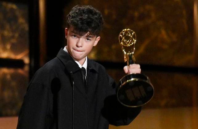 Owen Cooper accepts the Outstanding Supporting Actor in a Limited or Anthology Series or Movie award for Adolescence onstage at the 77th annual Primetime Emmy Awards at the Peacock Theater in Los Angeles on Sunday, September 14, 2025.  LAP2025091480455 JIMxRUYMEN