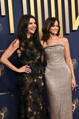 (L-R) Lauren Graham and Alexis Bledel arrive for the 77th annual Primetime Emmy Awards at the Peacock Theater in Los Angeles on Sunday, September 14, 2025.  LAP20250914128 CHISxCHEW