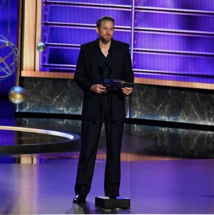 Charlie Hunnam speaks onstage at the 77th annual Primetime Emmy Awards at the Peacock Theater in Los Angeles on Sunday, September 14, 2025.  LAP202509143021 JIMxRUYMEN