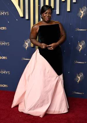 Uzo Aduba, a nominee for Outstanding Lead Actress in a Comedy Series, for her work on The Residence, arrives for the 77th annual Primetime Emmy Awards at the Peacock Theater in Los Angeles on Sunday, September 14, 2025.  LAP20250914751 JohnxMcCoy