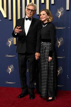Harrison Ford and Calista Flockhart arrive for the 77th annual Primetime Emmy Awards at the Peacock Theater in Los Angeles on Sunday, September 14, 2025.  LAP202509142758 JohnxMcCoy