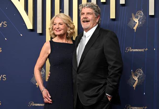 John Wells and his wife Marilyn arrives for the 77th annual Primetime Emmy Awards at the Peacock Theater in Los Angeles on Sunday, September 14, 2025.  LAP20250914807 JohnxMcCoy
